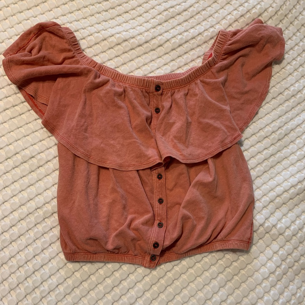 Free people washed red crop with button and ruffle detail, with tag, never worn.